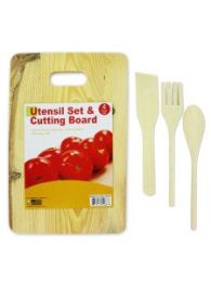 Cutting board with wood utensils